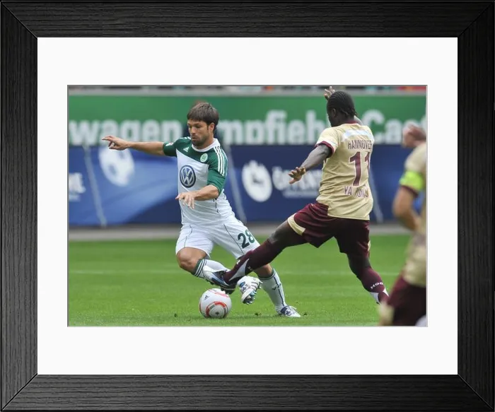 Framed Print : The German Bundesliga weekend derby game Vfl Wolfsburg versus Hanover 96 takes place on the 4th day of play Framed Print : The German Bundesliga weekend derby game Vfl Wolfsburg versus Hanover 96 takes place on the 4th day of play