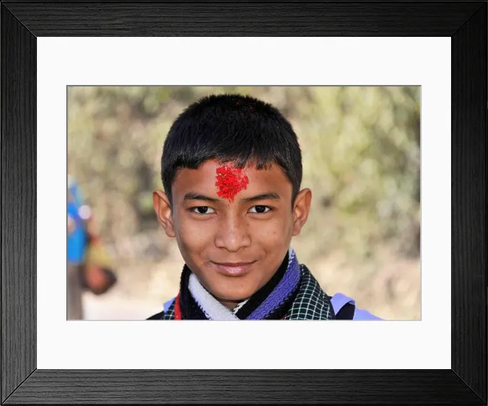 Framed Print : A smiling boy with a red mark on his forehead outdoors, Bhairahawa, Nepal Framed Print : A smiling boy with a red mark on his forehead outdoors, Bhairahawa, Nepal