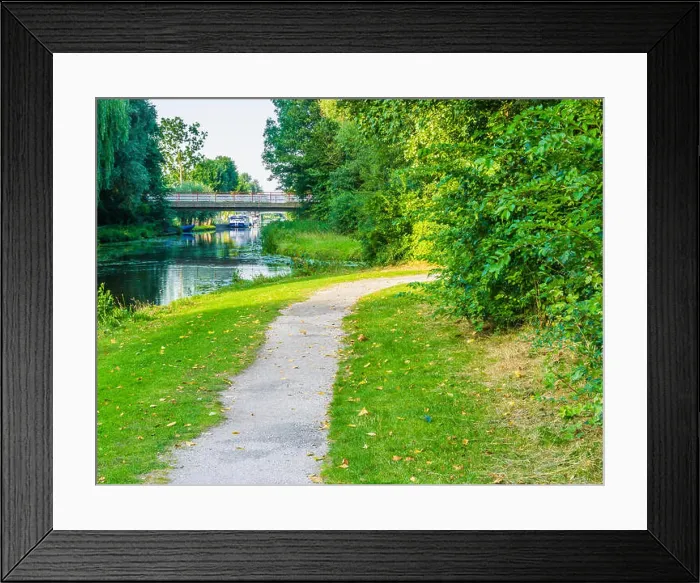Framed Print : curvy road with water pond and bridge view Framed Print : curvy road with water pond and bridge view