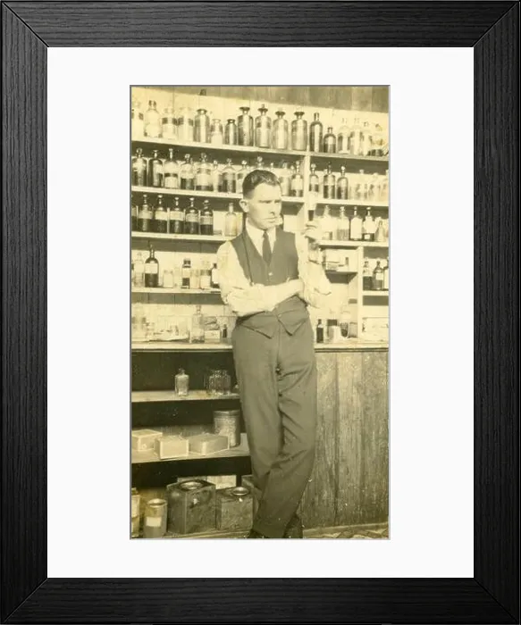 Framed Print : A pharmacist at his chemist shop in Petrie Terrace Framed Print : A pharmacist at his chemist shop in Petrie Terrace