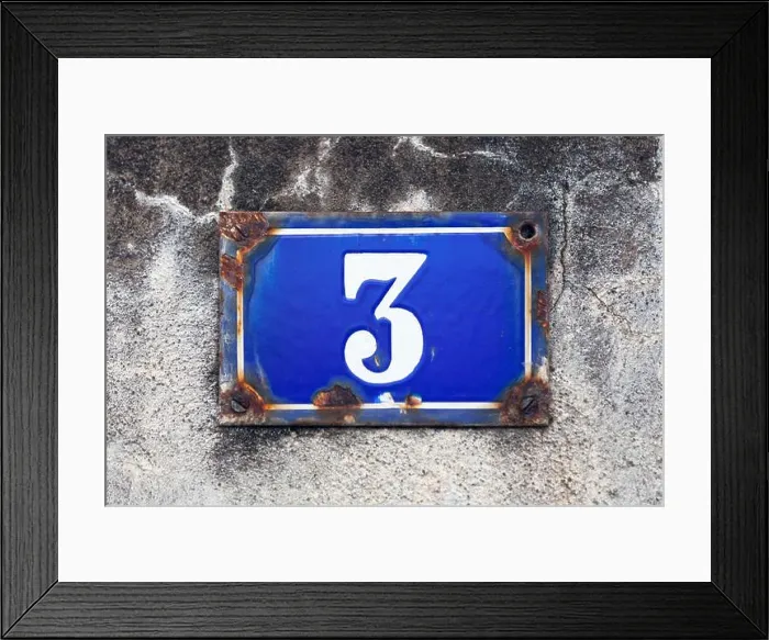 Framed Print : Rusty blue street plate on a white wall with a number 3 painted in white in the middle Framed Print : Rusty blue street plate on a white wall with a number 3 painted in white in the middle
