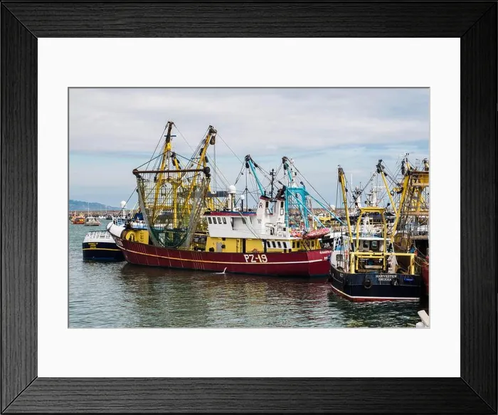 Framed Print : Commercial fishing trawlers in port in the outer harbour. Brixham, Devon, England, UK, Britain Framed Print : Commercial fishing trawlers in port in the outer harbour. Brixham, Devon, England, UK, Britain