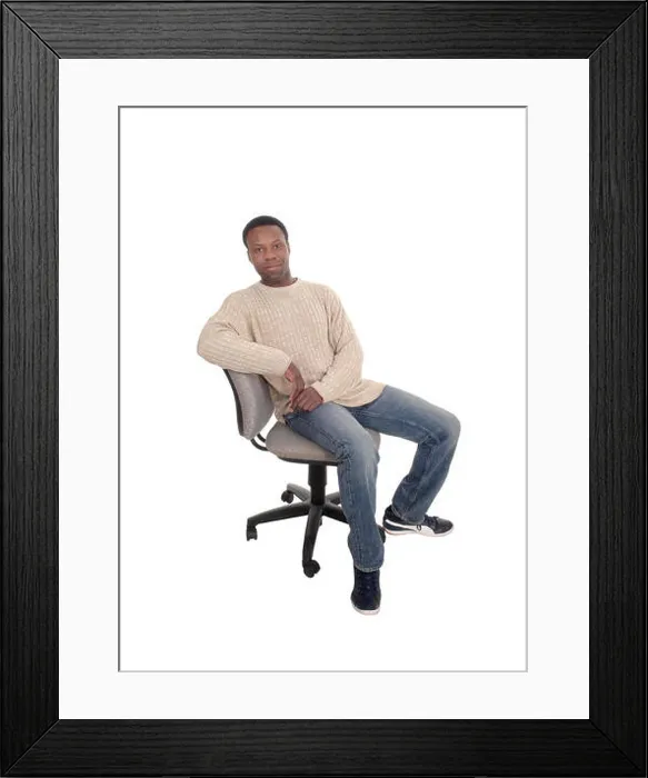 Framed Print : African man sitting on office chair and thinking Framed Print : African man sitting on office chair and thinking
