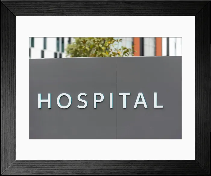 Framed Print : The word Hospital written in white capital letters on a grey background Framed Print : The word Hospital written in white capital letters on a grey background