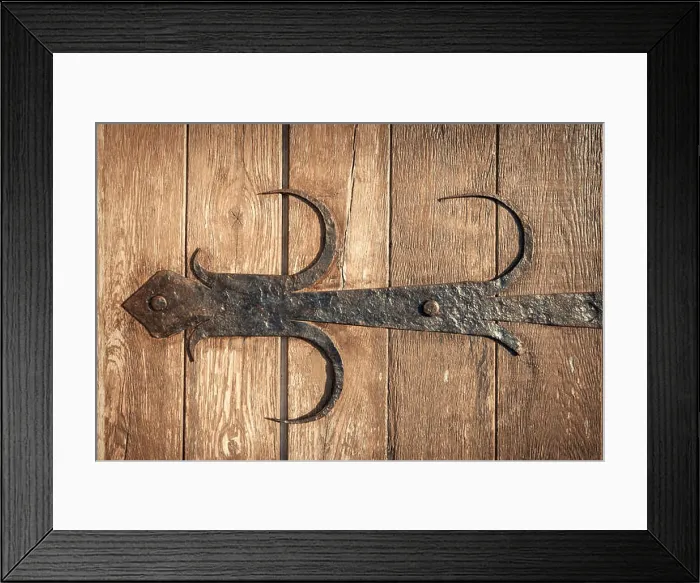 Framed Print : old rusty decorative element and wood door. Background for design Framed Print : old rusty decorative element and wood door. Background for design