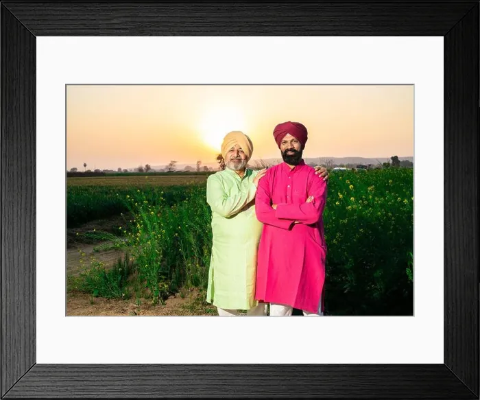 Framed Print : Portrait of happy punjabi srdar father and son wearing kurta and pagdi turban standing together at agriculture field Framed Print : Portrait of happy punjabi srdar father and son wearing kurta and pagdi turban standing together at agriculture field
