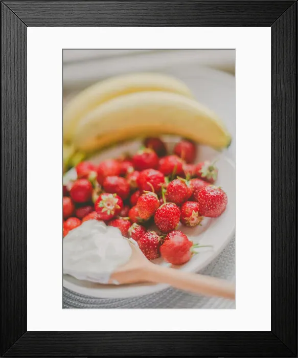 Framed Print : Bunch of bananas and strawberries. Photo toned style Instagram filters. Concept of healthy breakfast Framed Print : Bunch of bananas and strawberries. Photo toned style Instagram filters. Concept of healthy breakfast