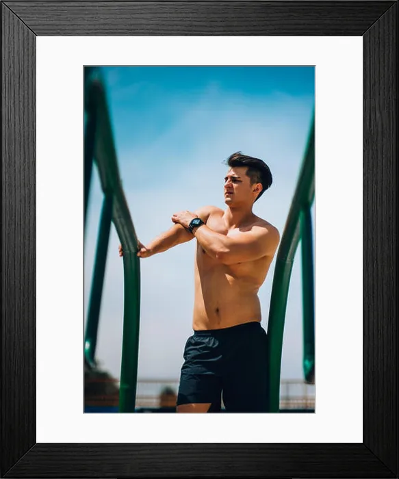 Framed Print : Shirtless sportive man doing strength training on parallel bars in outdoors gym Framed Print : Shirtless sportive man doing strength training on parallel bars in outdoors gym