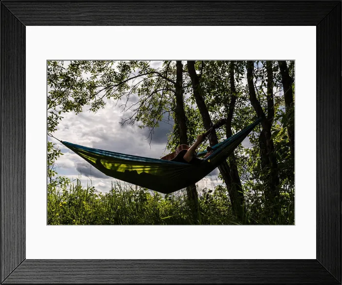 Framed Print : Teen Boy Plays Guitar While Relaxing in Hammock Outdoors Framed Print : Teen Boy Plays Guitar While Relaxing in Hammock Outdoors