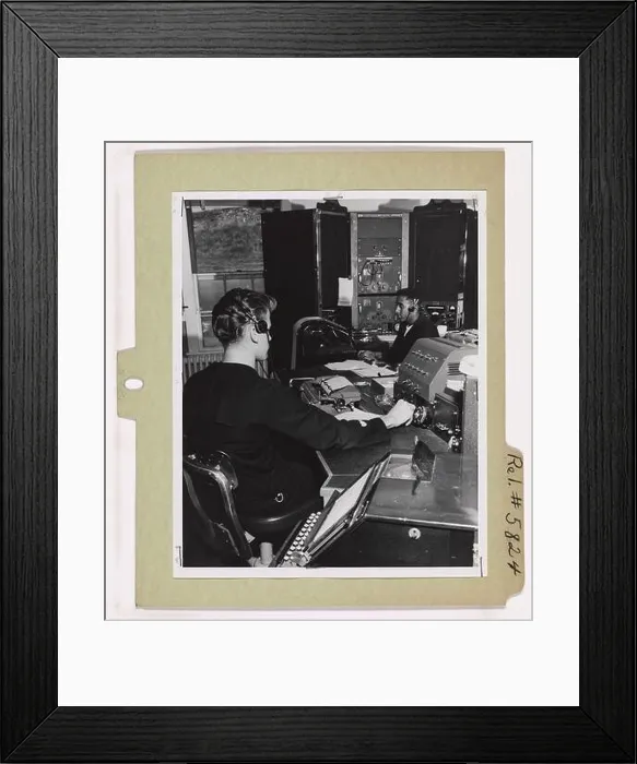 Framed Print : A Coast Guard radioman works in the main operating room at the Coast Guard Radio Station NMQ on Point Vicente Framed Print : A Coast Guard radioman works in the main operating room at the Coast Guard Radio Station NMQ on Point Vicente