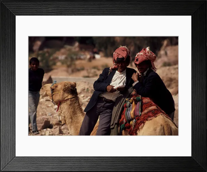 Framed Print : Two bedouin men offering camel rides in Petra Jordan Framed Print : Two bedouin men offering camel rides in Petra Jordan