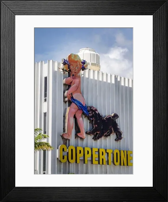 Framed Print : Vintage Coppertone advertising sign in Miami Florida on the side of a building on Biscayne Blvd Framed Print : Vintage Coppertone advertising sign in Miami Florida on the side of a building on Biscayne Blvd
