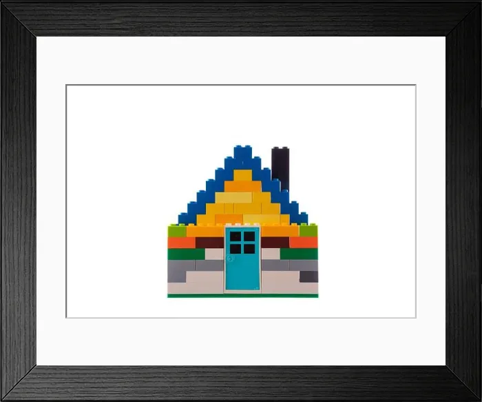 Framed Print : House made of classic building blocks and bricks, white studio background Framed Print : House made of classic building blocks and bricks, white studio background