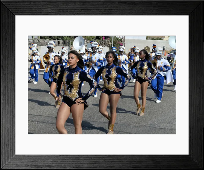 Framed Print : Girls participating in the yearly Caribbean festival parade come marching along Manchester Avenue in Westchester Framed Print : Girls participating in the yearly Caribbean festival parade come marching along Manchester Avenue in Westchester