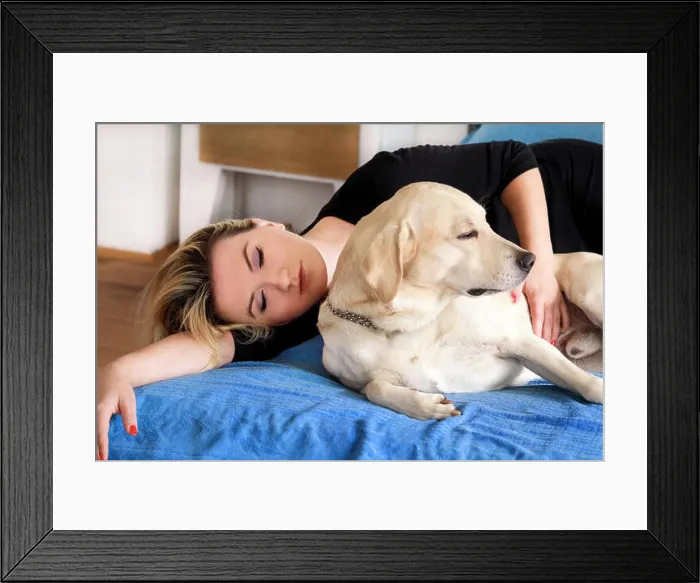 Framed Print : Woman with cute dogs at home. Handsome girl resting and sleeping with her dog in bed in bedroom Framed Print : Woman with cute dogs at home. Handsome girl resting and sleeping with her dog in bed in bedroom