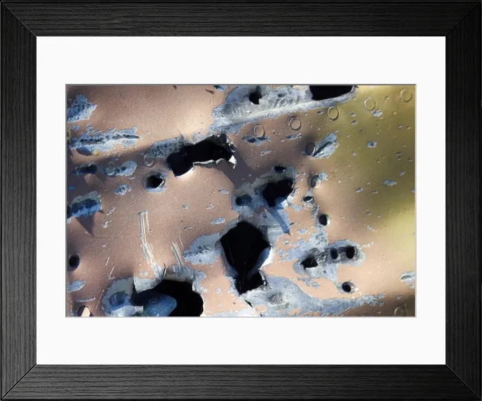 Framed Print : Remains of military aircraft (fighter) punched shell fragments and warmed by explosions of shells Framed Print : Remains of military aircraft (fighter) punched shell fragments and warmed by explosions of shells