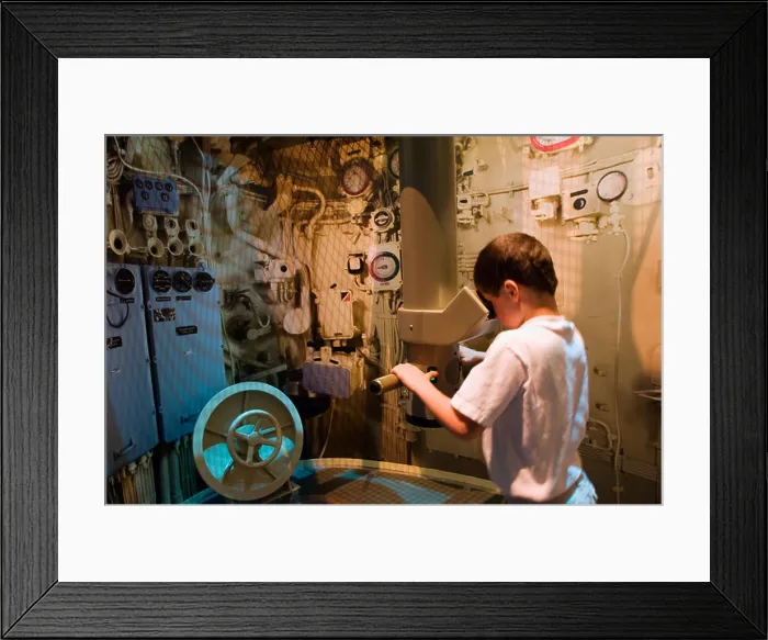 Framed Print : Kid looking through periscope at the U 505 submarine exhibit at the Museum of Science and Industry Chicago Illinois Framed Print : Kid looking through periscope at the U 505 submarine exhibit at the Museum of Science and Industry Chicago Illinois