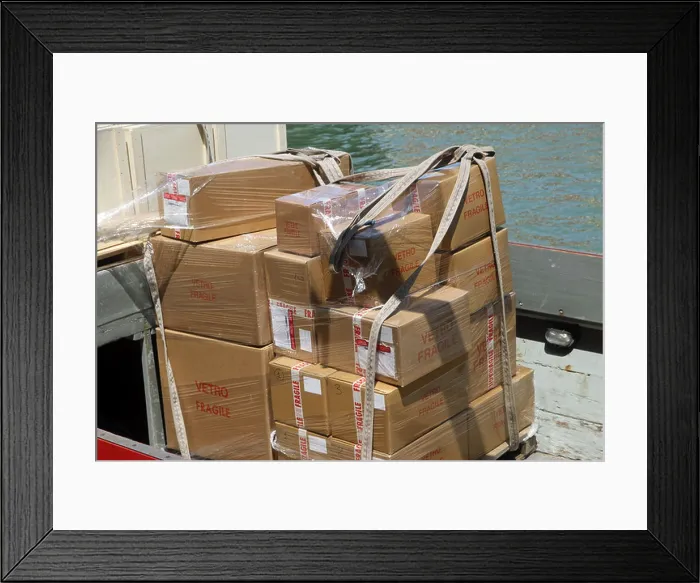Framed Print : boxes for transporting precious Murano glass chandeliers made in Italy and loaded on to a boat Framed Print : boxes for transporting precious Murano glass chandeliers made in Italy and loaded on to a boat