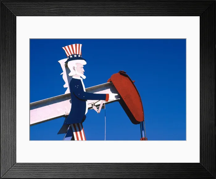 Framed Print : 'Uncle Sam' art on pump jack, used to lift crude oil from the well
