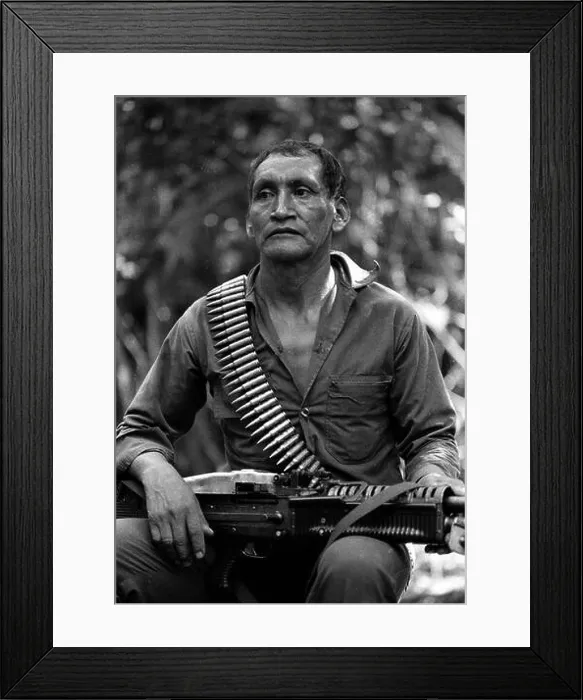 Framed Print : Stock image of a URNG guerrilla with a machine gun in the Ixcan Jungle Guatemala during the civil war there Framed Print : Stock image of a URNG guerrilla with a machine gun in the Ixcan Jungle Guatemala during the civil war there