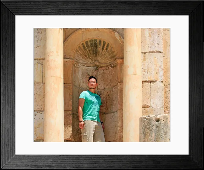 Framed Print : Young man posing as a statue in the Roman ruins of Jerash, Jordan Framed Print : Young man posing as a statue in the Roman ruins of Jerash, Jordan