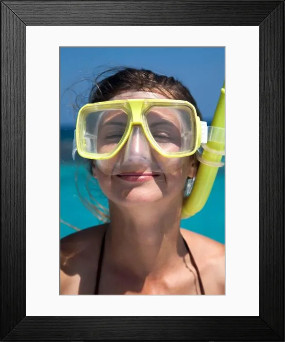 Framed Print : Close-up of a young woman wearing snorkeling gear with her eyes closed and a dreamy smile on her face at Stingray City Framed Print : Close-up of a young woman wearing snorkeling gear with her eyes closed and a dreamy smile on her face at Stingray City