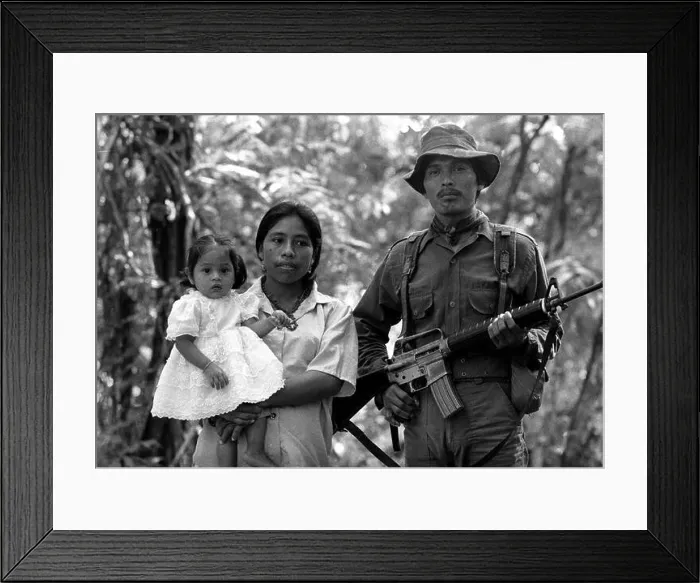 Framed Print : Stock image of a URNG guerrilla with his family in the Ixcan Jungle Guatemala Framed Print : Stock image of a URNG guerrilla with his family in the Ixcan Jungle Guatemala