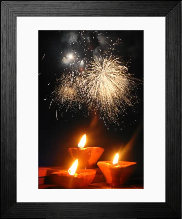 Framed Print : A perfect image showing the celebration of Diwali festival with traditional lamps and fireworks in the background Framed Print : A perfect image showing the celebration of Diwali festival with traditional lamps and fireworks in the background