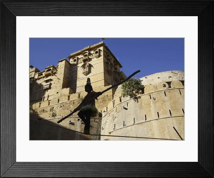 Framed Print : Girl performing acrobatics on rope sonar fort jaisalmer Rajasthan India