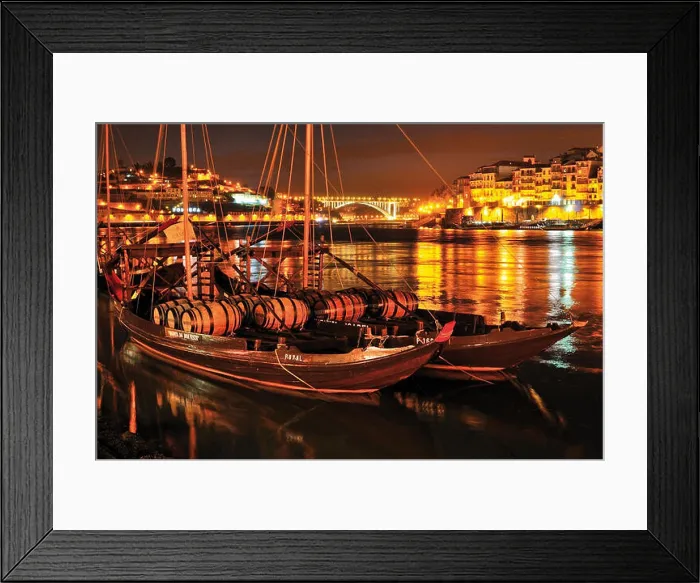Framed Print : Historic port wine ships with wine barrels anchoring on Douro river by night Framed Print : Historic port wine ships with wine barrels anchoring on Douro river by night