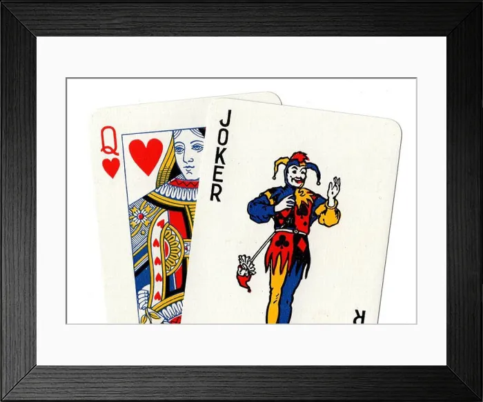 Framed Print : Vintage playing cards showing a joker and a queen of hearts on a white background Framed Print : Vintage playing cards showing a joker and a queen of hearts on a white background