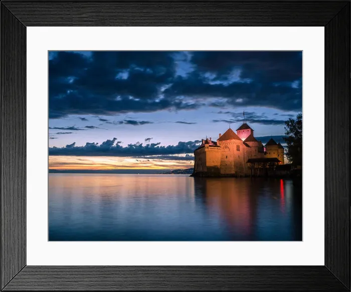 Framed Print : A view across Lake Geneva to Chateau de Chillon castle in Vaud Switzerland Framed Print : A view across Lake Geneva to Chateau de Chillon castle in Vaud Switzerland