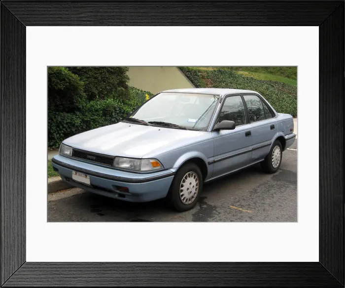 Framed Print : The 1988-1992 Toyota Corolla sedan is a compact and reliable car Framed Print : The 1988-1992 Toyota Corolla sedan is a compact and reliable car