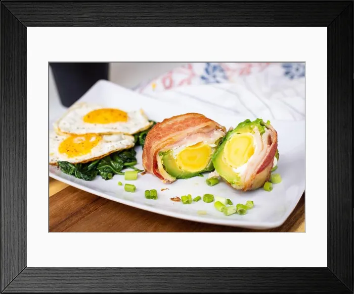 Framed Print : A delicious breakfast of eggs, bacon, and greens on a white square plate Framed Print : A delicious breakfast of eggs, bacon, and greens on a white square plate