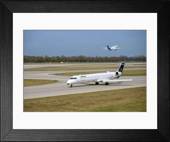 Framed Print : Lufthansa CityLine Mitsubishi CRJ-900LR With The Aircraft Registration D-ACNA Is Taxiing For Take Off On The Northern Framed Print : Lufthansa CityLine Mitsubishi CRJ-900LR With The Aircraft Registration D-ACNA Is Taxiing For Take Off On The Northern