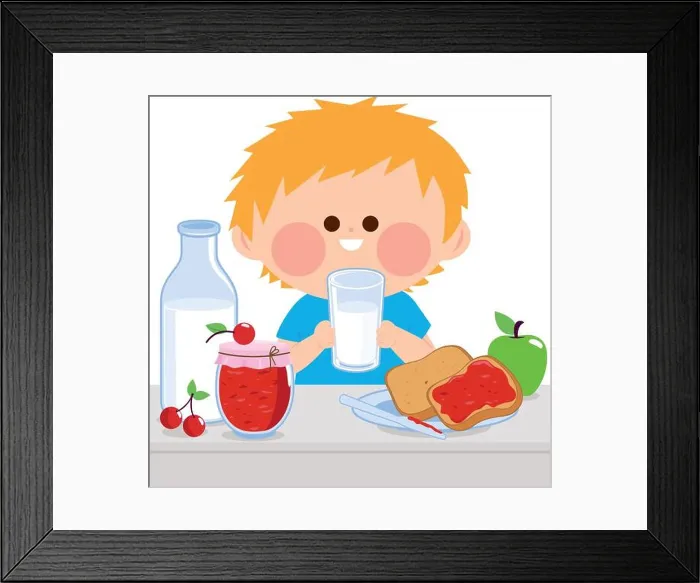 Framed Print : Child eating at home in the kitchen Framed Print : Child eating at home in the kitchen