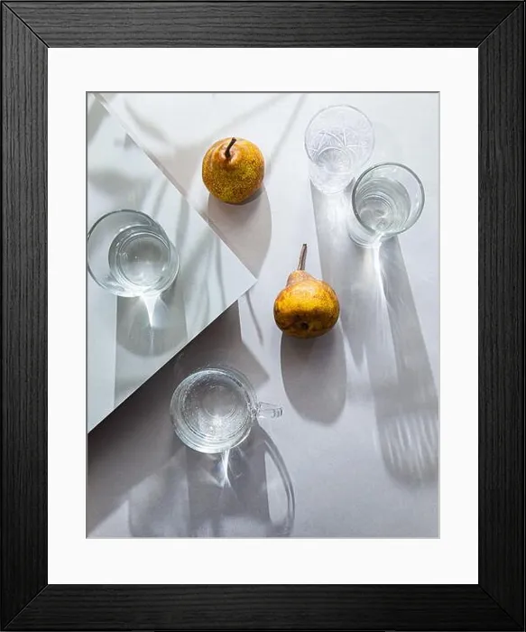 Framed Print : Minimalistic still life of pears and glasses of water top view. Summer composition light and shadow on a gray table Framed Print : Minimalistic still life of pears and glasses of water top view. Summer composition light and shadow on a gray table