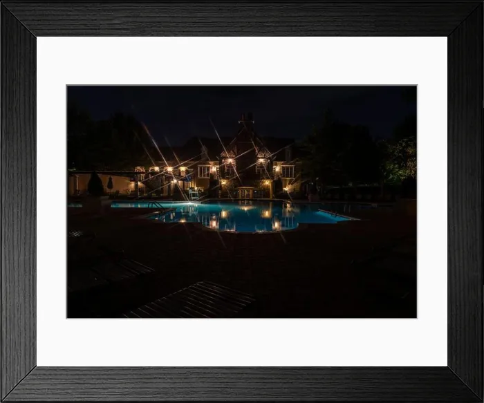 Framed Print : A swimming pool lit up for a night swim Framed Print : A swimming pool lit up for a night swim