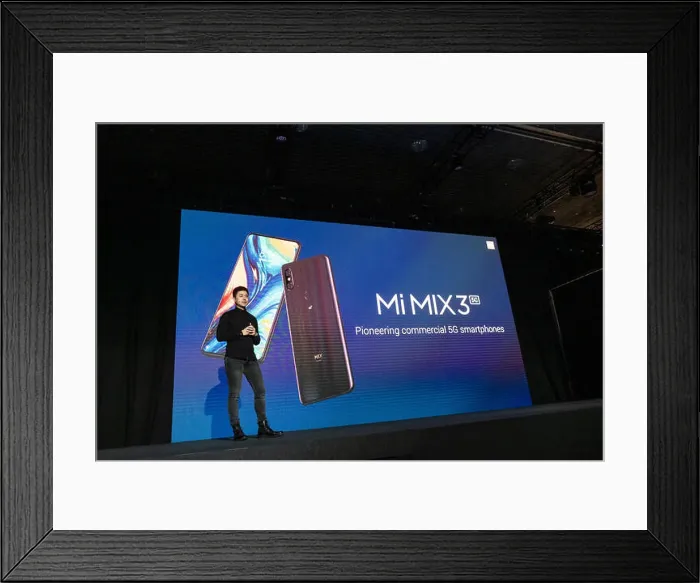 Framed Print : Donovan Sung, director of Product Management Xiaomi Global is seen presenting the new Mi MIX3 during the event Framed Print : Donovan Sung, director of Product Management Xiaomi Global is seen presenting the new Mi MIX3 during the event