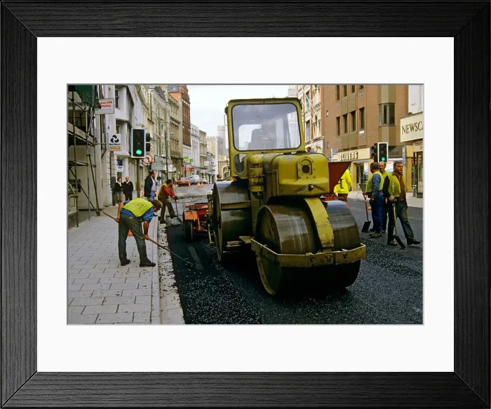 Framed Print : Road roller used to lay tarmac in city centre Cardiff Wales UK Framed Print : Road roller used to lay tarmac in city centre Cardiff Wales UK