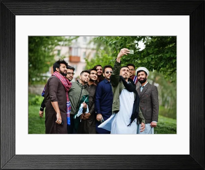 Framed Print : Group of pakistani man wearing traditional clothes salwar kameez or kurta making selfie on mobile phone Framed Print : Group of pakistani man wearing traditional clothes salwar kameez or kurta making selfie on mobile phone
