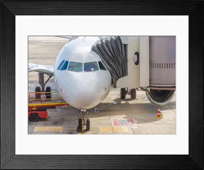 Framed Print : Airplane at the airport with gangway Framed Print : Airplane at the airport with gangway