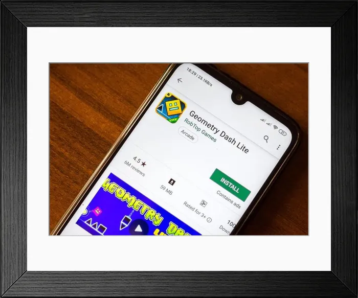 Framed Print : Ivanovsk, Russia - June 26, 2019: Geometry Dash Lite app on the display of smartphone or tablet Framed Print : Ivanovsk, Russia - June 26, 2019: Geometry Dash Lite app on the display of smartphone or tablet