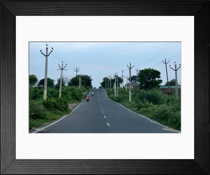 Framed Print : single lane highway in india having electric poles on each side Framed Print : single lane highway in india having electric poles on each side