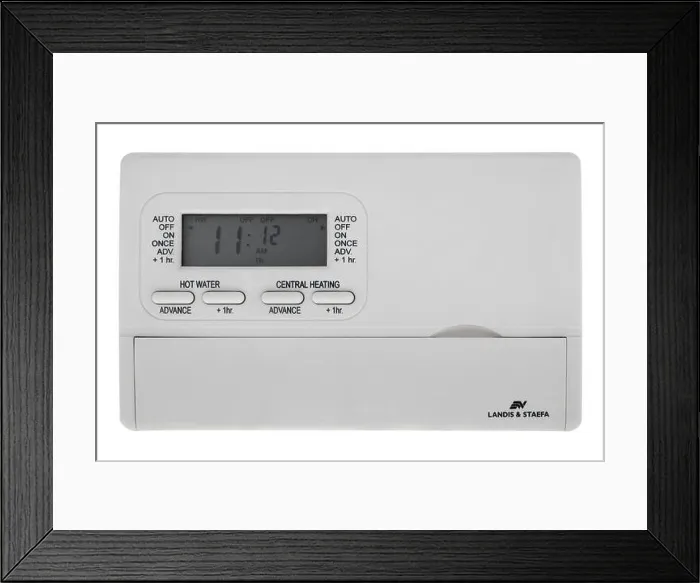 Framed Print : Central heating programmable timer control unit on white background Framed Print : Central heating programmable timer control unit on white background