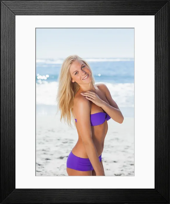 Framed Print : Blonde woman posing and smiling at camera Framed Print : Blonde woman posing and smiling at camera