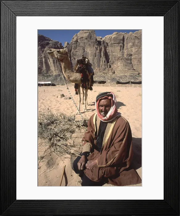 Framed Print : Bedouin tribesman with his camel in Wadi Rum Jordan Framed Print : Bedouin tribesman with his camel in Wadi Rum Jordan