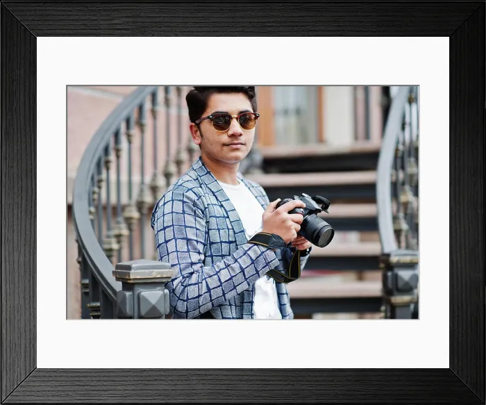 Framed Print : Stylish indian young man photographer at sunglasses wear casual posed outdoor against iron stairs with dslr photo Framed Print : Stylish indian young man photographer at sunglasses wear casual posed outdoor against iron stairs with dslr photo