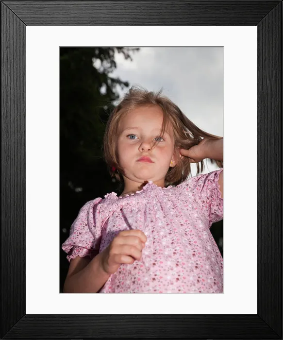 Framed Print : For year-old girl with a sad expression