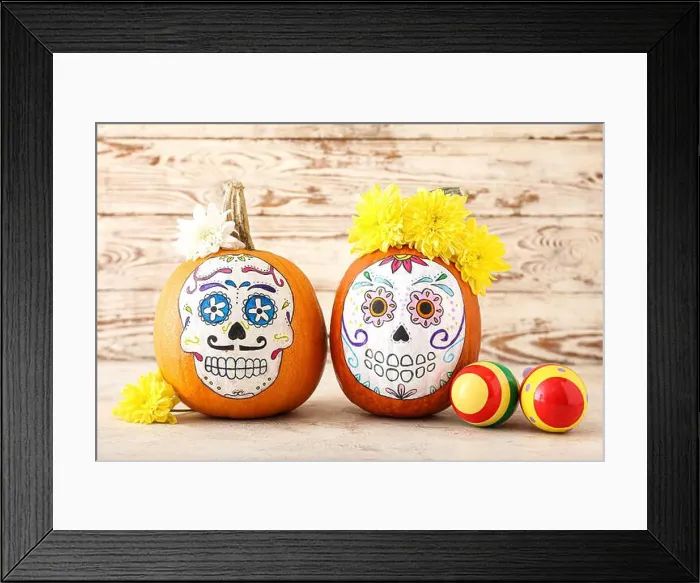 Framed Print : Pumpkins with painted skull on table. Celebration of Mexico's Day of the Dead (El Dia de Muertos) Framed Print : Pumpkins with painted skull on table. Celebration of Mexico's Day of the Dead (El Dia de Muertos)